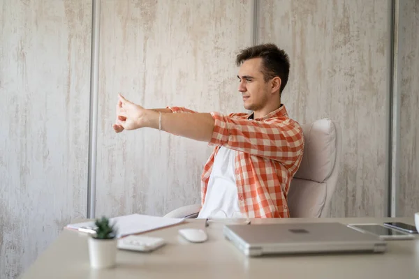 One Man Freelancer Stretch While Sitting Office Work Sitting Chair — Fotografia de Stock