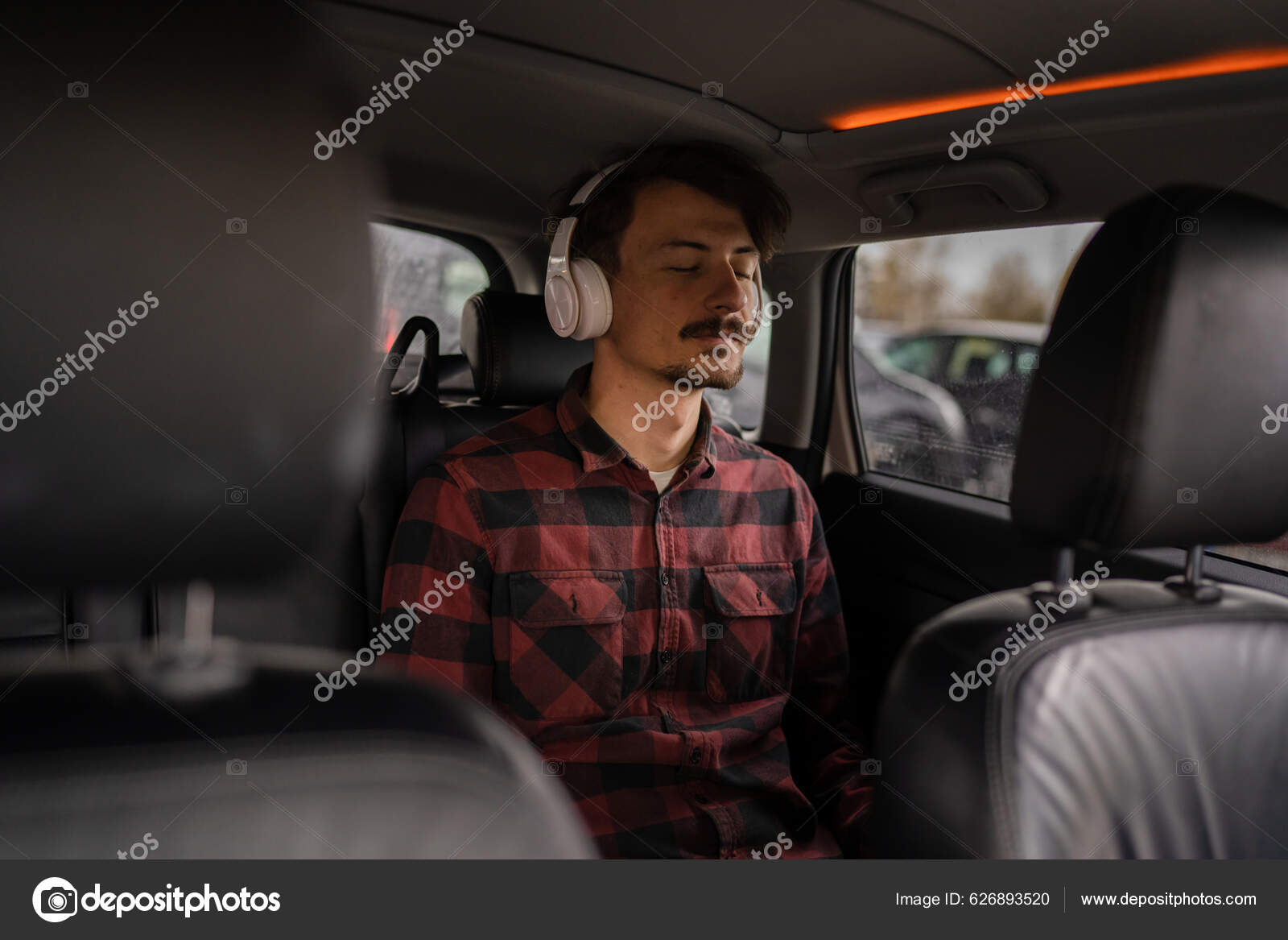 One Man Young Adult Caucasian Male Sit Car Seat Headphones Stock Photo by  ©Miljan 626893520