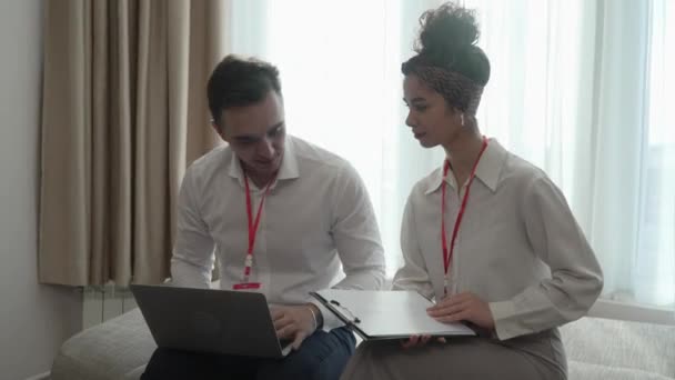 Two People Man Woman Colleagues Sitting Together Hotel Room Contracts — Stok Video