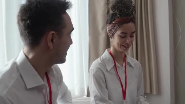 Two People Man Woman Colleagues Sitting Together Hotel Room Contracts — Stockvideo
