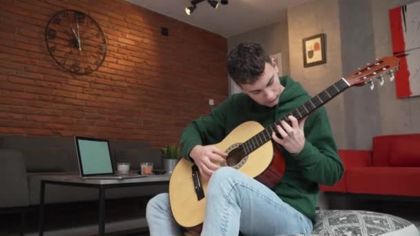 One Young Man Caucasian Teenager Sit Home Room Playing Guitar — Stockvideo