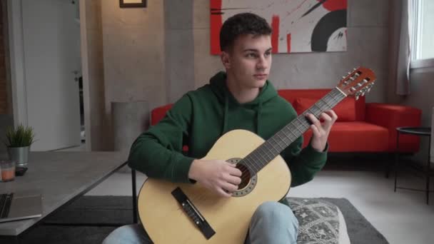 One Young Man Caucasian Teenager Sit Home Room Playing Guitar — Stock Video