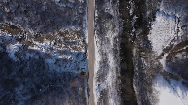 Car Drive Snow Winter Day Road Mountain Range Aerial View — стоковое видео