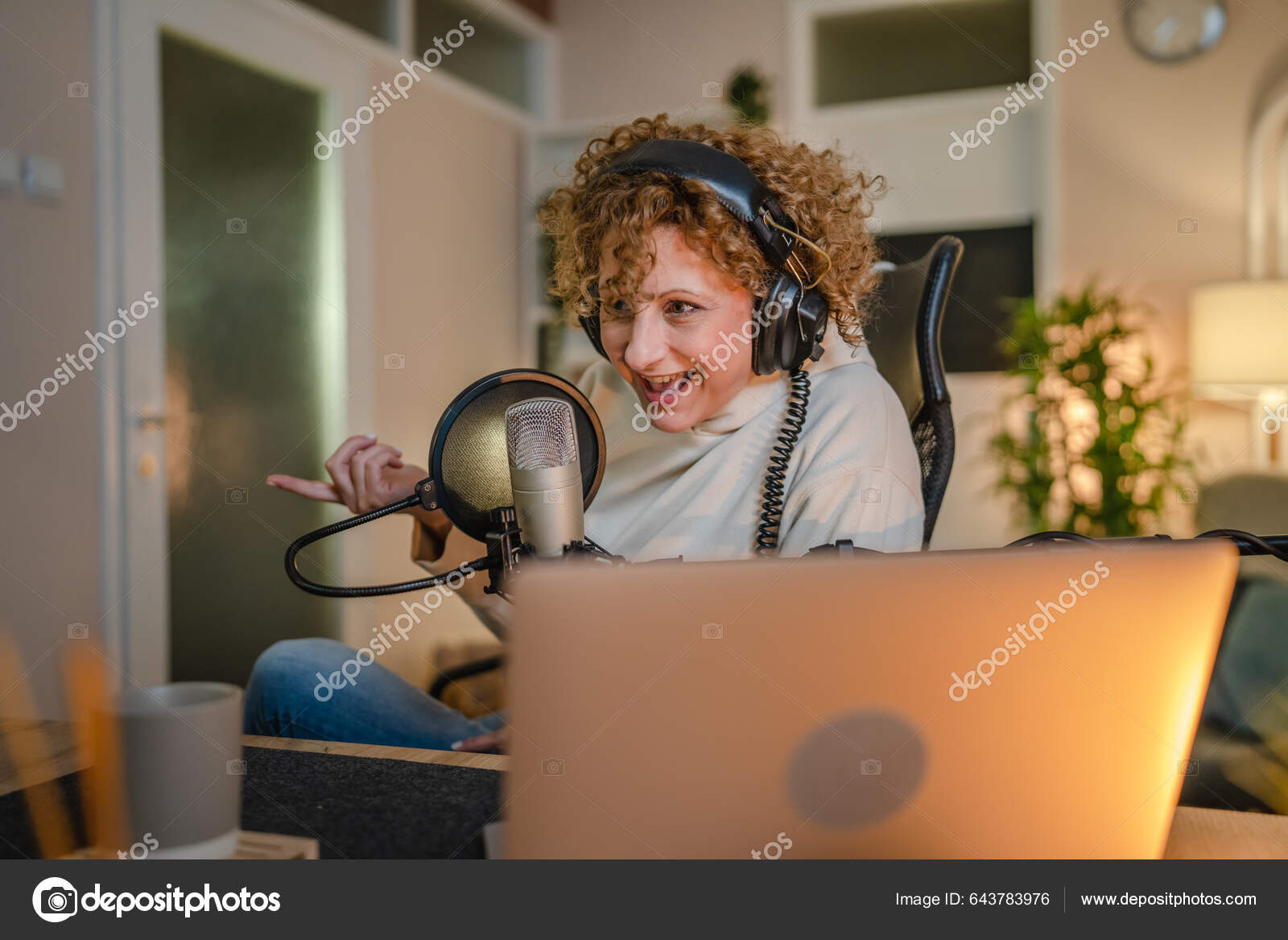 One Woman Caucasian Female Blogger Vlogger Gesticulating While Streaming Video Stock Photo by ©Miljan 643783976