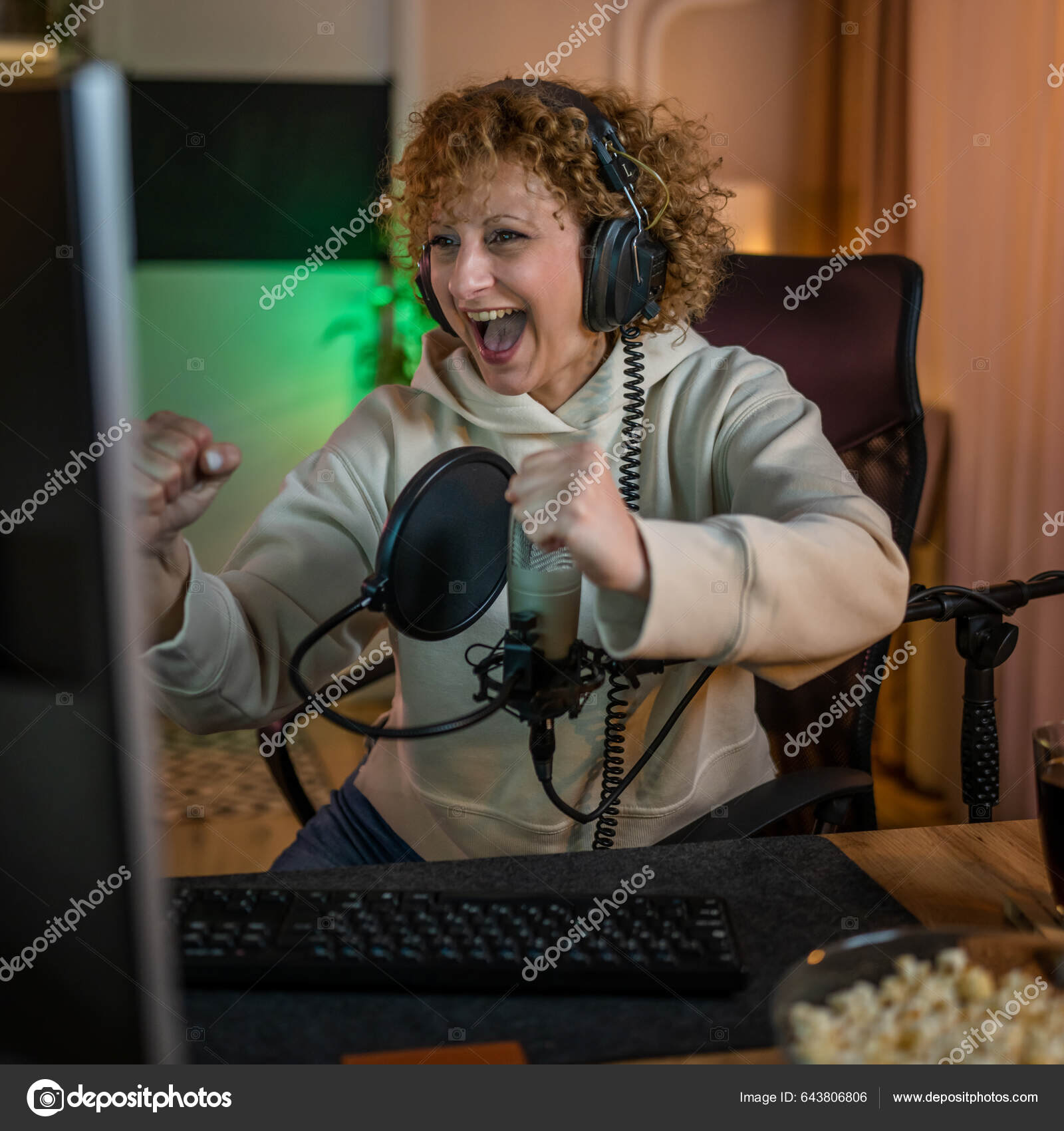 Mature Woman Play Video Games Computer While Streaming Social Media Stock  Photo by ©Miljan 643806806