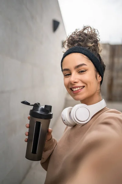 One Young Woman Headphones Prepare Training Hold Supplement Shaker Bottle — Stock Photo, Image