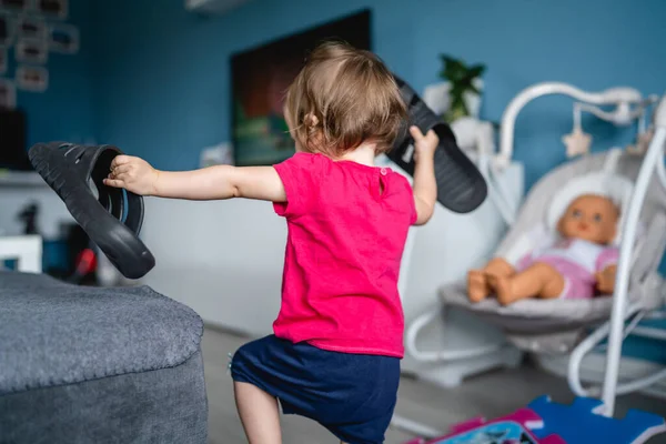 One Caucasian Toddler Girl Child Playing Slippers Home Room Alone — Stock Photo, Image