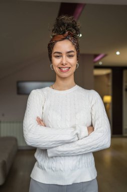 portrait of one woman young caucasian female standing at home smile