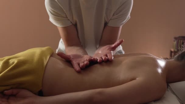 Unknown Woman Lying While Have Back Massage Male Caucasian Therapist — Stock Video