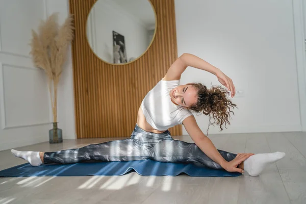 One Young Woman Caucasian Female Yoga Stretching Practice Home — Stockfoto