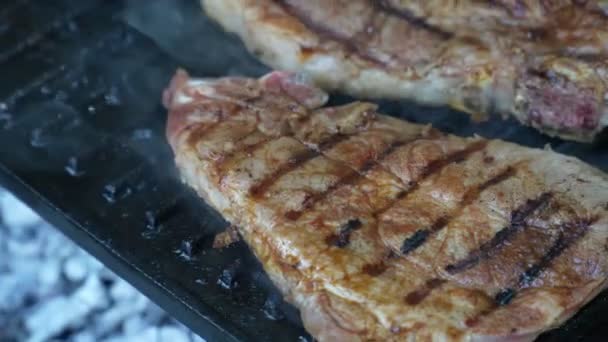 Fresh Pork Meat Grill Close Hand Held Video — Stock Video