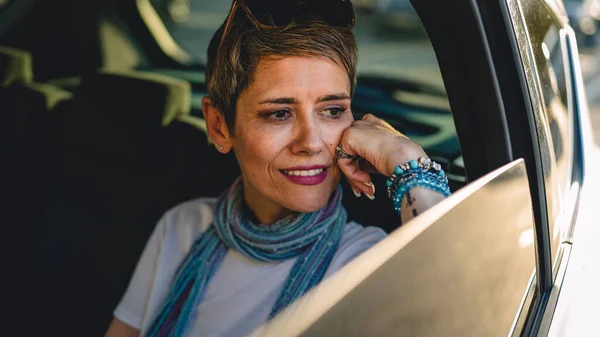 One Mature Woman Caucasian Female Sitting Back Seat Car Looking — Foto Stock