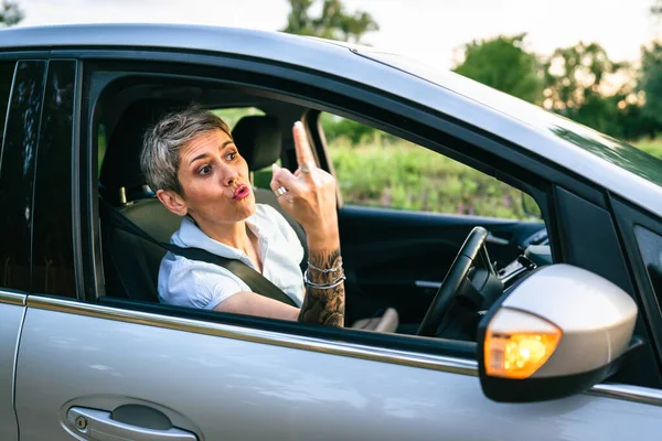 One Woman Senior Mature Female Driver Showing Middle Finger Trough — Foto Stock