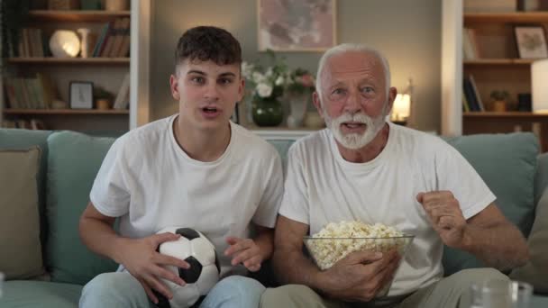 Caucasian Teenager Senior Man Grandfather Grandson Sit Sofa Bed Home — Stock Video
