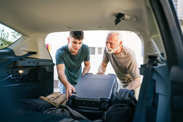 Two Men Teenager Senior Man Grandfather Grandson Pack Baggage Luggage — Stock Photo, Image