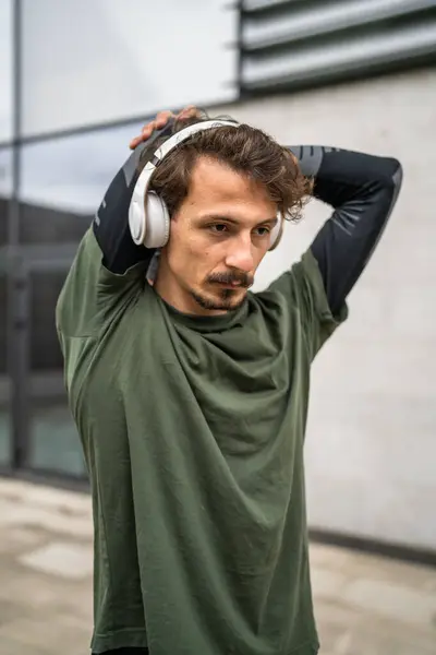 One Man Modern Caucasian Male Stretch Outdoor Training Wear Green — 스톡 사진