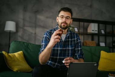 One man take medicine drugs bottle pills or nutrition supplement