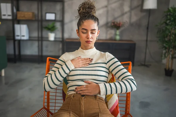 one woman adult caucasian female meditate millennial meditation practicing mindfulness yoga with eyes closed at home real people self care concept copy space