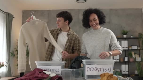 Mother Son Stand Home Choose Clothes Donation Teenage Mad Caucasian — Stock Video