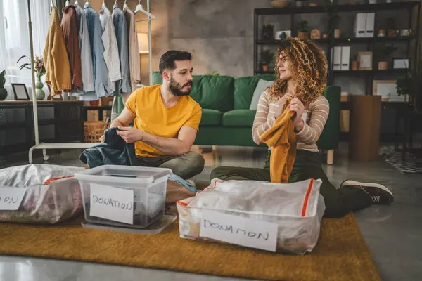 Husband Wife Man Woman Couple Stand Home Choose Clothes Donation — Stock Photo, Image