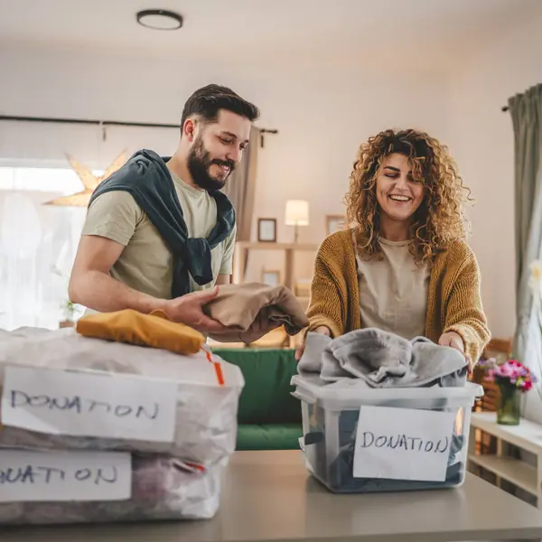 Husband Wife Man Woman Couple Stand Home Choose Clothes Donation — Stock Photo, Image