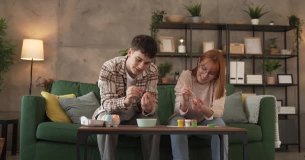 Young Man Woman Couple Brother Sister Paint Easter Eggs — Stock Video