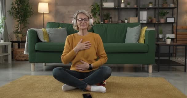 Mature Senior Woman Practice Guided Meditation Manifestation Home — Stock Video