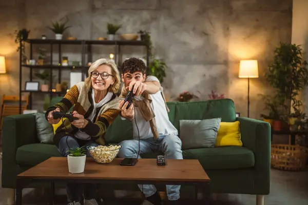 Teenager Male His Mother Mature Woman Man Play Console Video — Stock Photo, Image