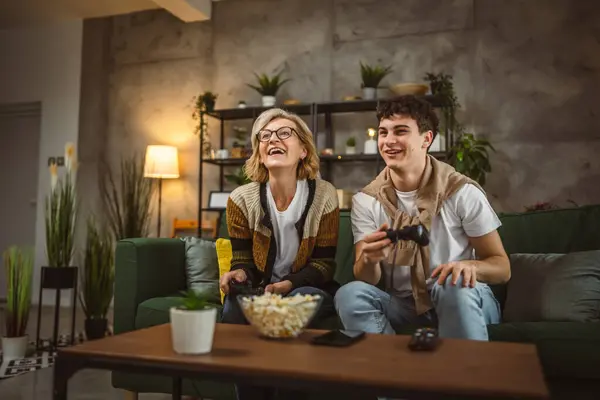 Teenager Male His Mother Mature Woman Man Play Console Video — Stock Photo, Image