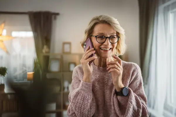 One Mature Blonde Woman Stand Home Use Mobile Phone Talk — Stock Photo, Image