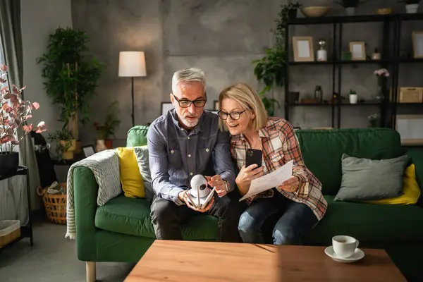 Couple Home Mature Senior Caucasian Husband Wife Connect Install Cctv — Stock Photo, Image