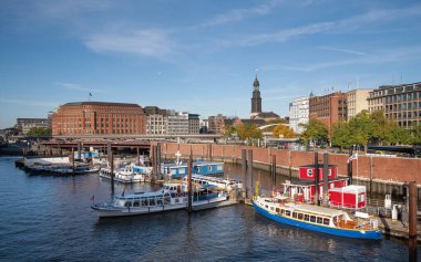 HAMBURG, GERMANY - OCTOBER 24, 2021: Panoramic image of cityscape of Hamburg close to the Elbe river on October 24, 2021 in Germany