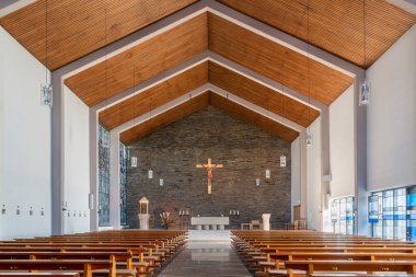 BERGISCH GLADBACH, GERMANY - JULY 30, 2020: View throught the main aisle of the Parish church Saint Conrad on July 30, 2020 in Bergisch Gladbach, Germany