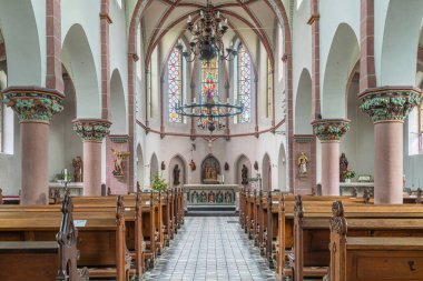 BERGISCH GLADBACH, GERMANY - JULY 24, 2020: View throught the main aisle of the Parish church Saint Severin on July 24, 2020 in Bergisch Gladbach, Germany
