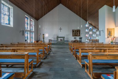 ODENTHAL, GERMANY - JULY 20, 2020: View throught the main aisle of the Parish church Saint Michael on July 20, 2020 in Odenthal, Germany
