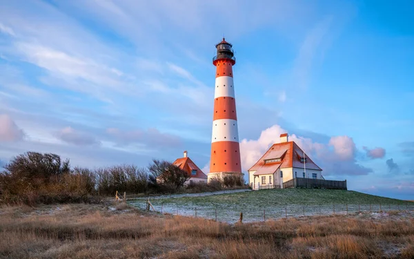 Panoramic image of Westerhever lighthouse against sky, North Frisia, Germany 
