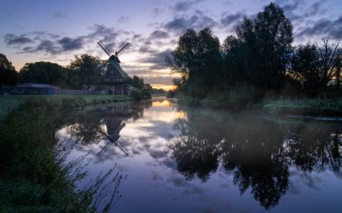 Hengstforder mill close to Bad Zwischenahn on a foggy morning, Lower Saxony, Germany clipart