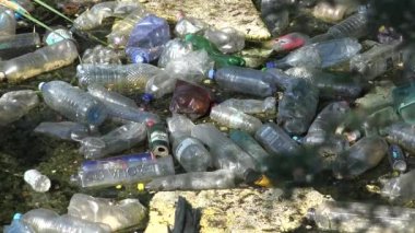 Garbage Plastic Bottles in River, Pollution in Mountains Running Water, Trash Polluted Forest, Polluting Nature, Global Warming