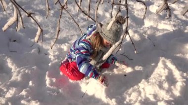 Child Playing in Snow in Winter, Kid Making a Snowman in Mountains, Girl Plays Outdoor in Park, Children in Wintertime