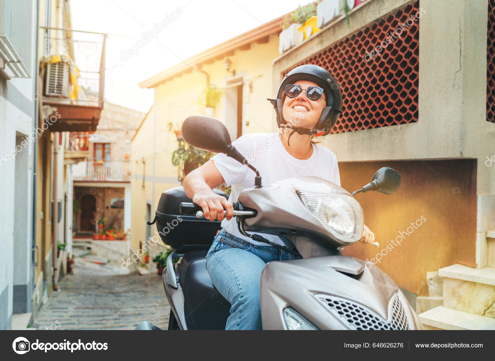 depositphotos 646626276 stock photo cheerfully smiling woman helmet sunglasses