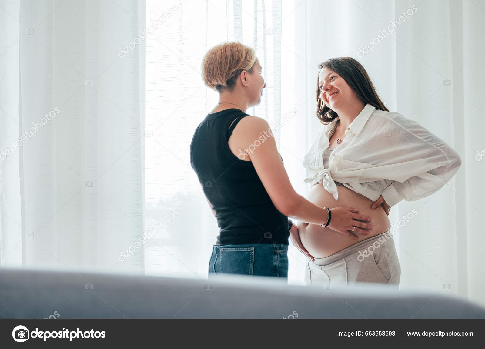 Smiling Young Woman Tender Touching Partners Female Pregnant Belly Same Stock Photo by ©solovyova 663558598 pic