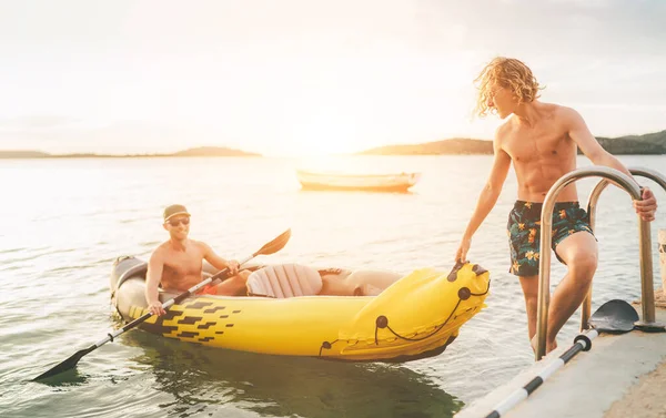 Father Teenager Son Bright Yellow Inflatable Kayak Returning Back Evening — стокове фото