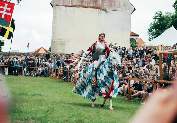 stock image Cerven Kame Castle, Slovakia - May 25, 2024: People in medieval attires historical reenactment event. Reconstructions provide valuable insights into daily life, past eras traditions in Slovakia.