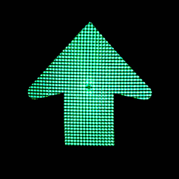 Right direction. Green arrow light on traffic lights on black background.