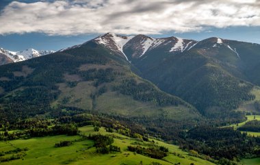 Beautiful view of Western Tatras Mountains with peak Baranec in Slovakia. Green landscape and hills. Aerial drone photography.