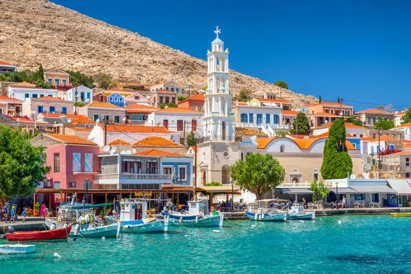 stock image Halki, Greece - July 6, 2022: Fishing boats in harbor in island Halki (Chalki) in Greece