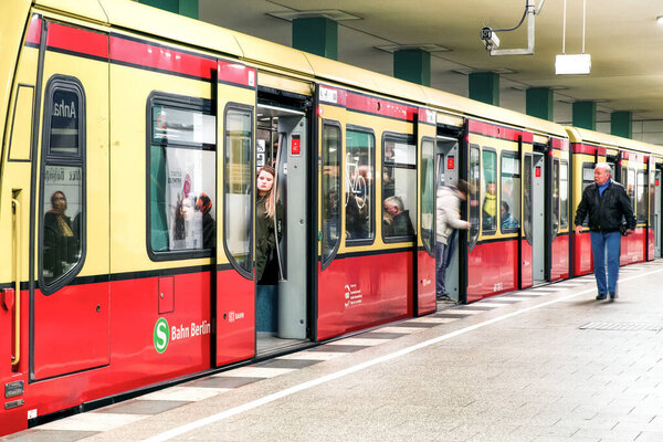 Berlin, Germany - April 6, 2017: Passengers in train at S-bahn station in city Berlin