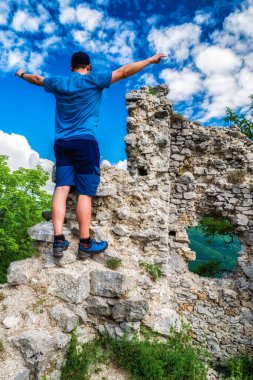 Visitor at ruins of castle Zniev, Slovakia clipart