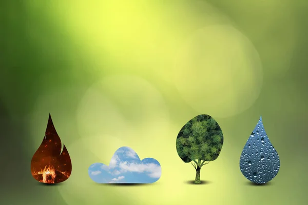 Artistic four elements of fire, water, air and nature, isolated on sunny nature animation background with copy space.