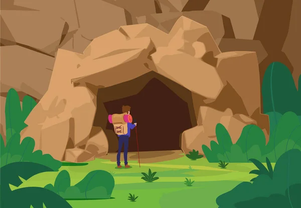 어두운 동굴로 들어가는 관광객 극단적 하이킹 모험의 개념입니다 들어가는 — 스톡 벡터
